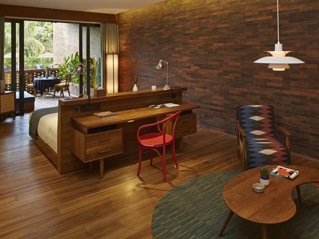 An overview of the living, sleeping and outdoor area of the luxurious Island Suite at Potato Head Suites in Seminyak, Bali.