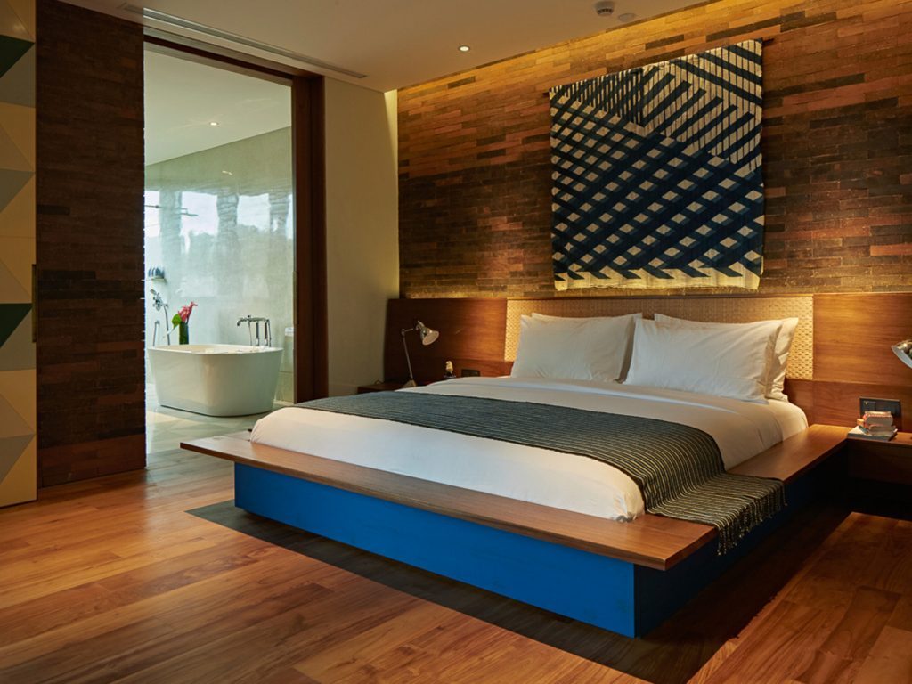 The comfortable sleeping area of the Rooftop Suite at Potato Head Suites located at Desa Potato Head in Seminyak, Bali.