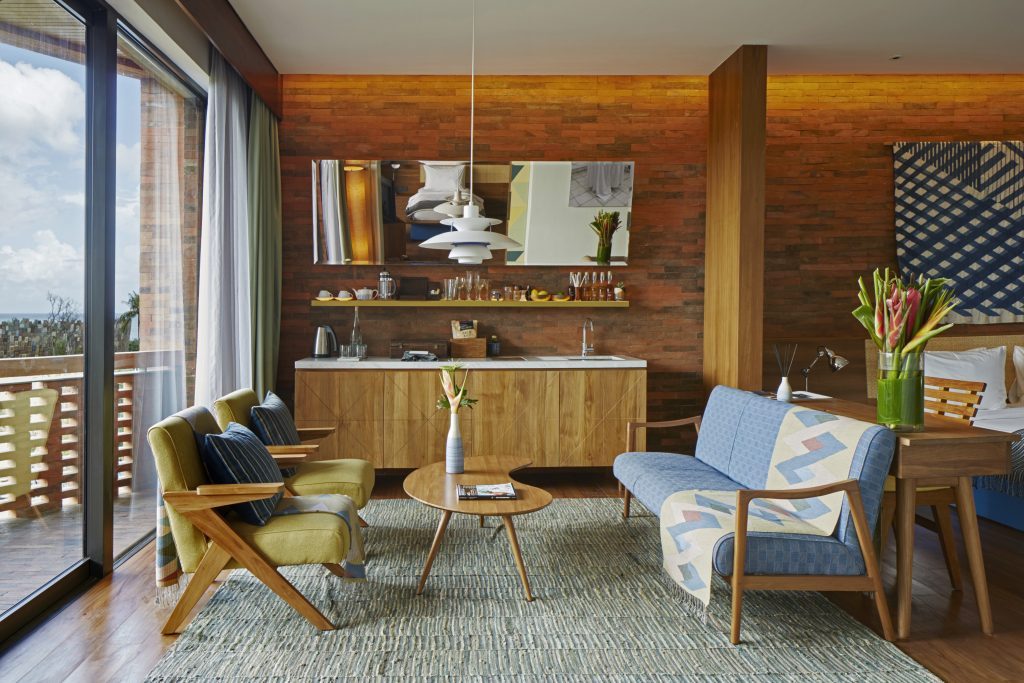 A full view of the living area in the luxurious Two Bedroom Suite at Potato Head Suites in Seminyak, Bali.