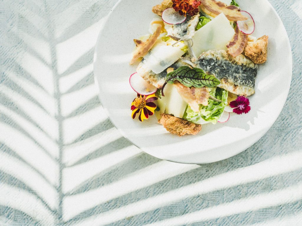 A bowl of salad served at the Potato Head Beach Club, located at Desa Potato Head in Seminyak, Bali.